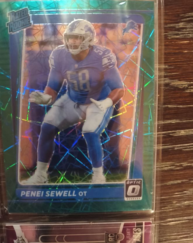 2021 Panini Donruss Optic #260 Penei Sewell Purple Shock Prizm — front