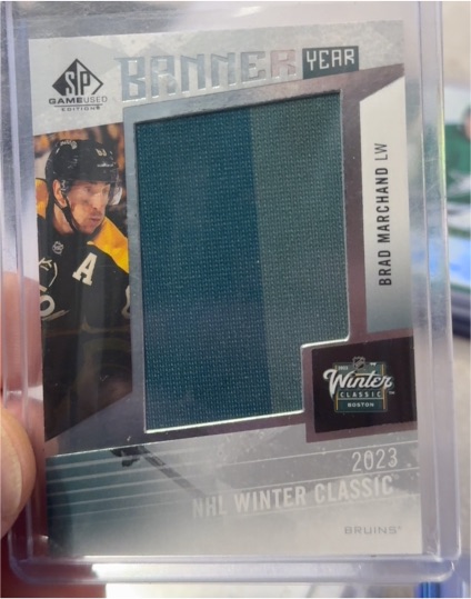 2023 Upper Deck SP Game Used Banner Year Winter Classic #BYWC-BM Brad Marchand — front