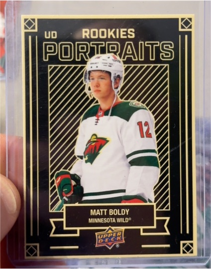 2022-23 Upper Deck Series 1 UD Portraits #P-31 Matt Boldy — front