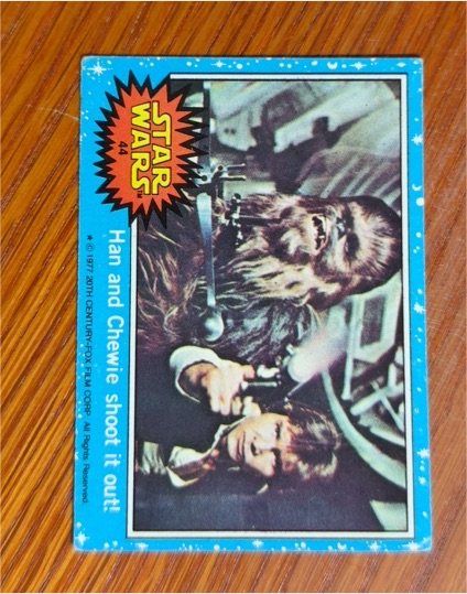 1977 Topps Star Wars Blue Series 1 #44 Han and Chewie shoot it out! — front