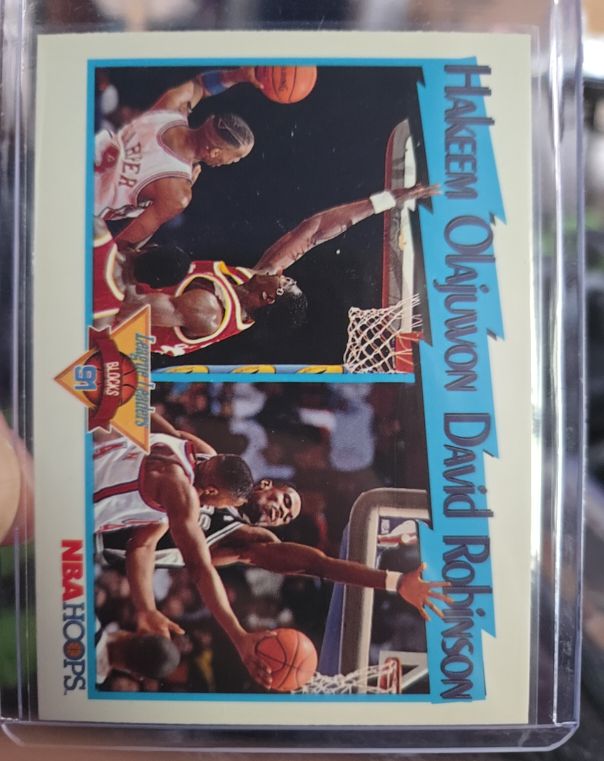 1991-92 NBA Hoops #309 Hakeem Olajuwon / David Robinson League Leaders Blocks — front