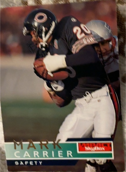 1995 SkyBox Impact #19 Mark Carrier — front