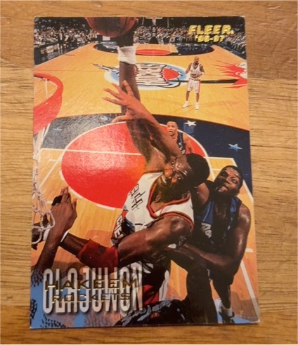 1996-97 Fleer #42 Hakeem Olajuwon — front