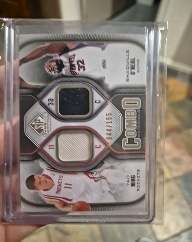 2009-10 Upper Deck SP Game Used Combo Materials #CM-MO Shaquille O'Neal Yao Ming — front