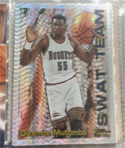 1996-97 Topps Season's Best Swat Team #21 Dikembe Mutombo — front