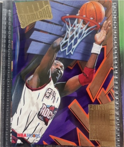 1995-96 NBA Hoops Slamland #SL19 Hakeem Olajuwon — front
