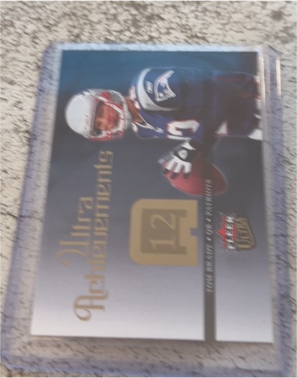 2006 Fleer Ultra Achievements #UA-TB Tom Brady — front