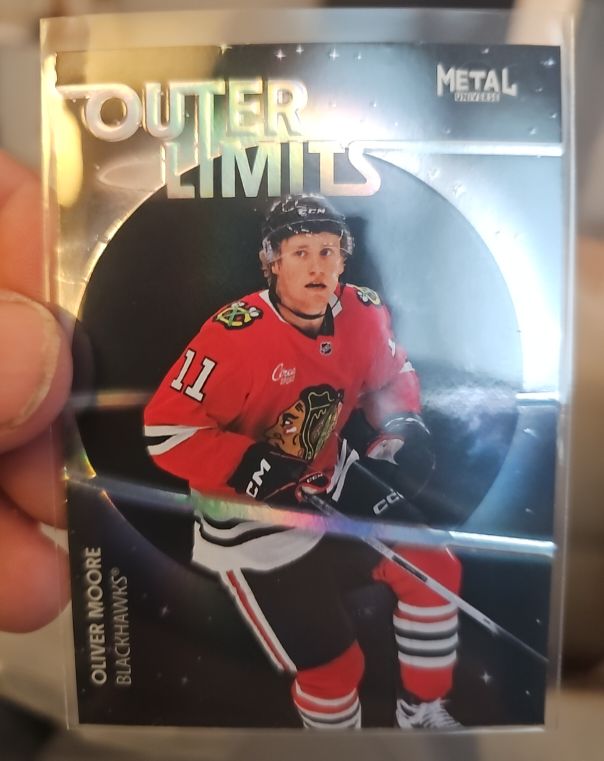 2025-26 SkyBox Metal Universe Outer Limits #OL-88 Oliver Moore — front