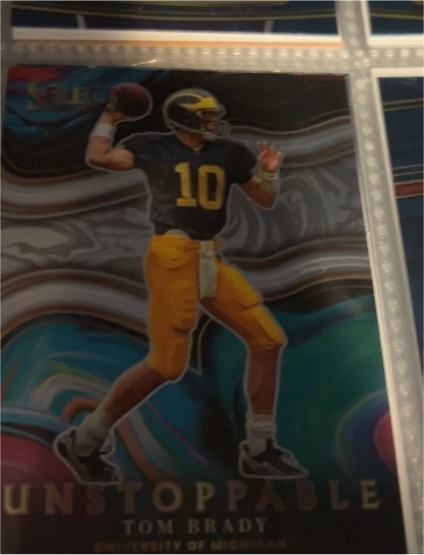 2022 Panini Select Draft Picks Unstoppable #US-TB Tom Brady Michigan Wolverines — front