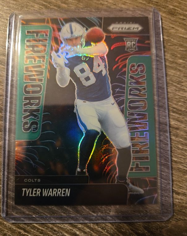 2025 Panini Prizm #12 Tyler Warren Fireworks Rookie Card — front