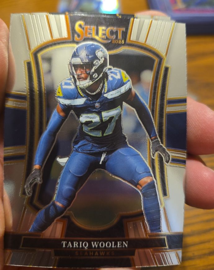 2025 Panini Select Premier Level #115 Tariq Woolen — front