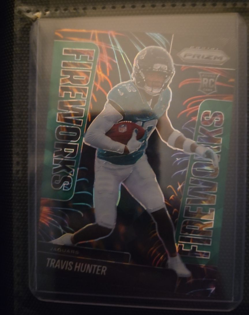 2025 Panini Prizm #13 Travis Hunter Fireworks Rookie — front