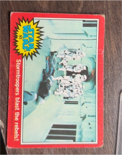 1977 Topps Star Wars #93 Stormtroopers blast the rebels! — front