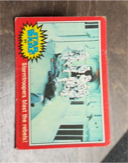1977 Topps Star Wars #93 Stormtroopers blast the rebels — front