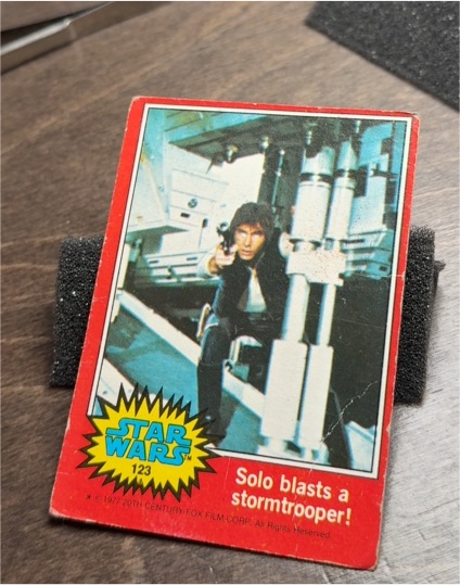 1977 Topps Star Wars Red Series 2 #123 Han Solo blasts a stormtrooper! — front