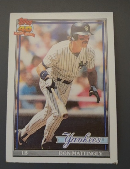 1991 Topps #100 Don Mattingly — front