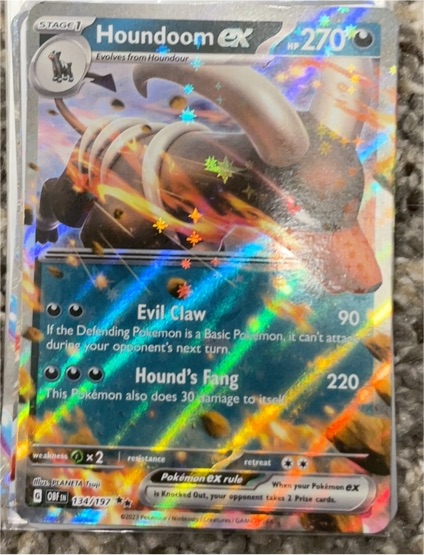 2023 Pokémon TCG Obsidian Flames #134 Houndoom ex — front