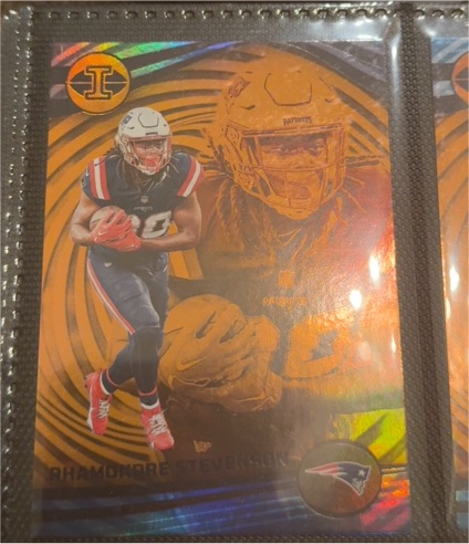 2023 Panini Illusions #77 Rhamondre Stevenson Orange — front