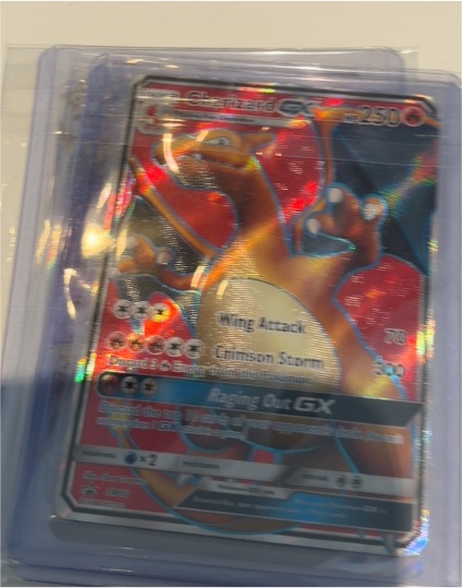 2017 Pokémon SM Black Star Promo #SM60 Charizard GX — front
