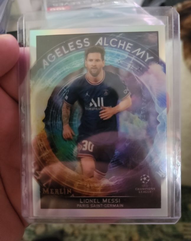 2021-22 Topps Merlin UEFA Champions League Ageless Alchemy #AA-1 Lionel Messi — front