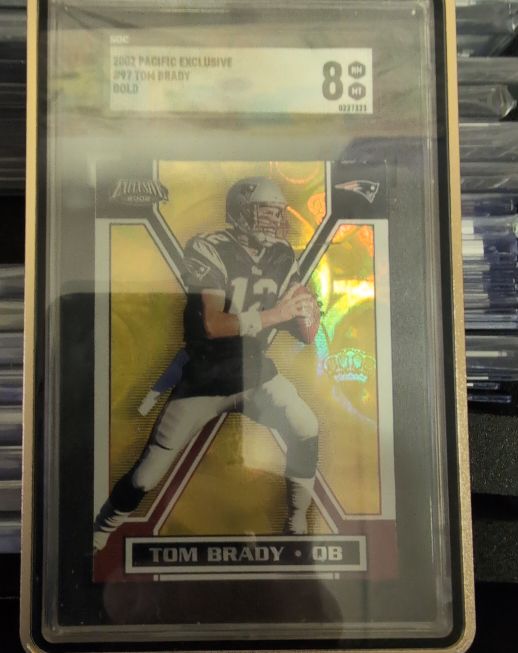 2002 Pacific Exclusive #97 Tom Brady Gold — front