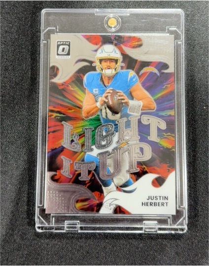 2025 Panini Donruss Optic #12 Justin Herbert Light It Up — front