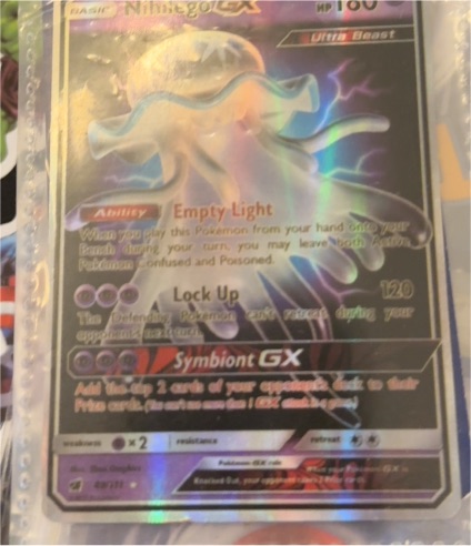 2017 Pokémon TCG Crimson Invasion #49 Nihilego GX — front