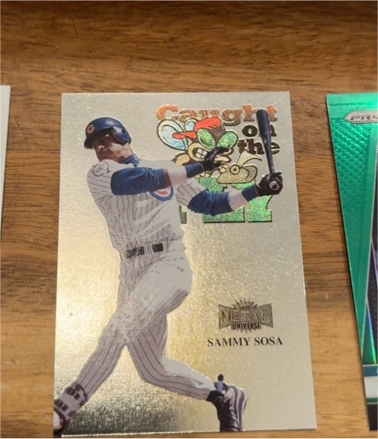 1999 Skybox Metal Universe #242 Sammy Sosa — front