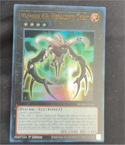 2019 Yu-Gi-Oh! Battles of Legend: Monster Mayhem #BLMM-EN153 Number 69: Heraldry Crest — front