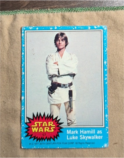 1977 Topps Star Wars #57 Mark Hamill as Luke Skywalker — front