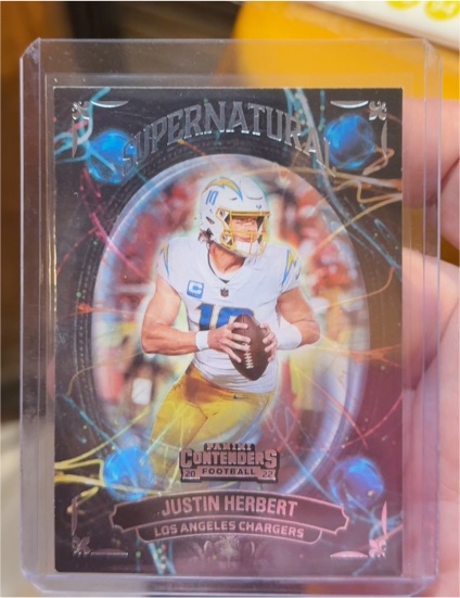 2022 Panini Contenders #SN-JHE Justin Herbert Supernatural — front