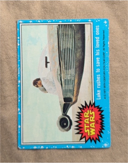 1977 Topps Star Wars Blue Series 1 #25 Luke rushes to save his loved ones — front