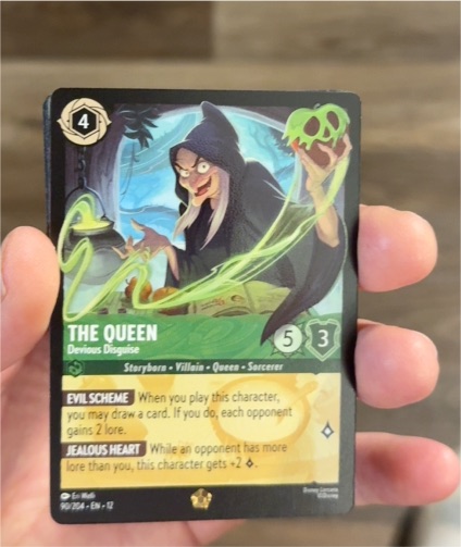 Disney Lorcana #90 The Queen Devious Disguise — front