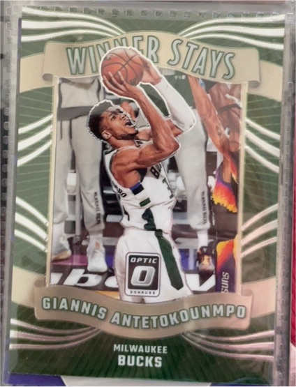 2023-24 Panini Donruss Optic #1 Giannis Antetokounmpo Winner Stays — front