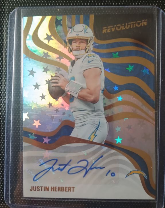 2025 Panini Revolution #RSA-JHT Justin Herbert Revolution Signatures Astro — front