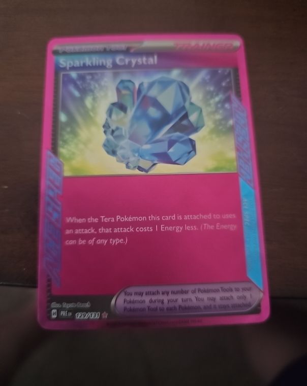 2021 Pokemon TCG Prismatic Evolutions #129 Sparkling Crystal — front