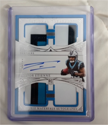 2025 Panini National Treasures #RMAQ-TEE Trevor Etienne Rookie Quad Patch Auto — front
