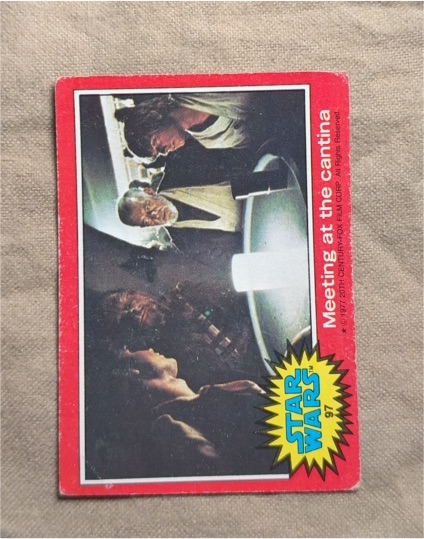 1977 Topps Star Wars #97 Meeting at the Cantina — front
