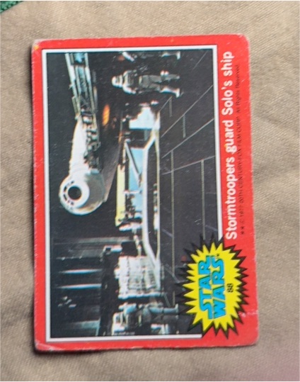 1977 Topps Star Wars Series 2 Red #88 Stormtroopers guard Solo's ship — front