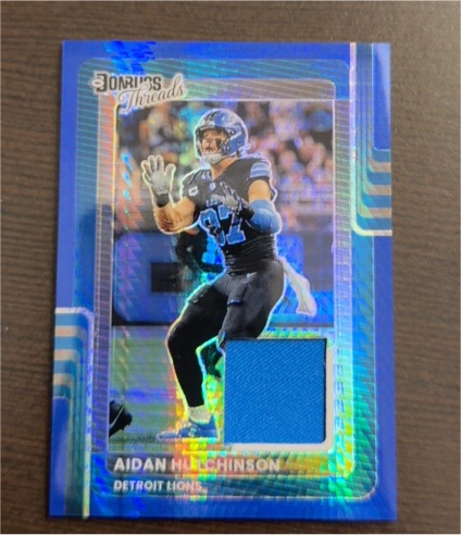 2025 Donruss Optic #DTBH-AHN Aidan Hutchinson Blue Prizm Threads — front