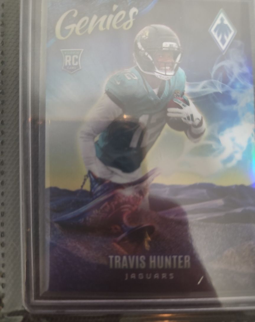2025 Panini Phoenix Genies #12 Travis Hunter — front