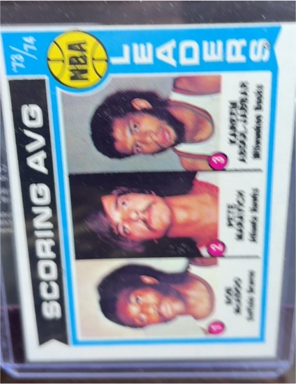 1974-75 Topps #145 NBA Scoring Average Leaders Bob McAdoo / Pete Maravich / Kareem Abdul-Jabbar — front