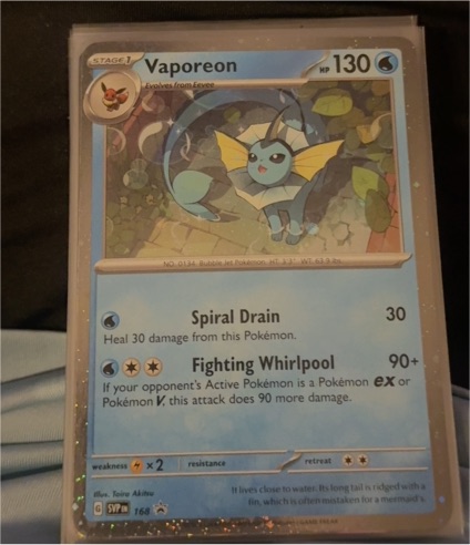 2023 Pokémon TCG SV Black Star Promo #168 Vaporeon — front