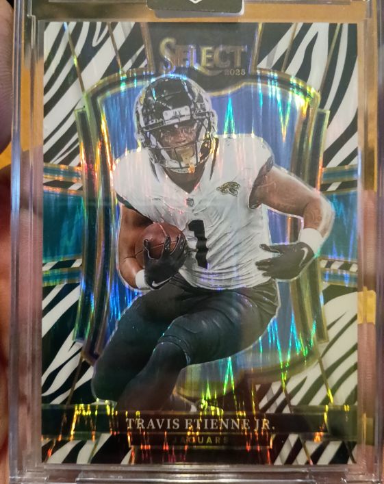 2025 Panini Select #130 Travis Etienne Jr. Zebra Prizm — front