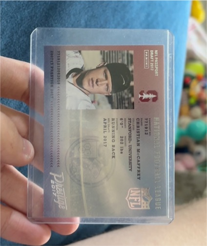 2017 Panini Prestige NFL Passport #12 Christian McCaffrey Rookie Card — front