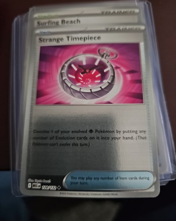 2023 Pokemon Mega Evolution #128 Strange Timepiece — front