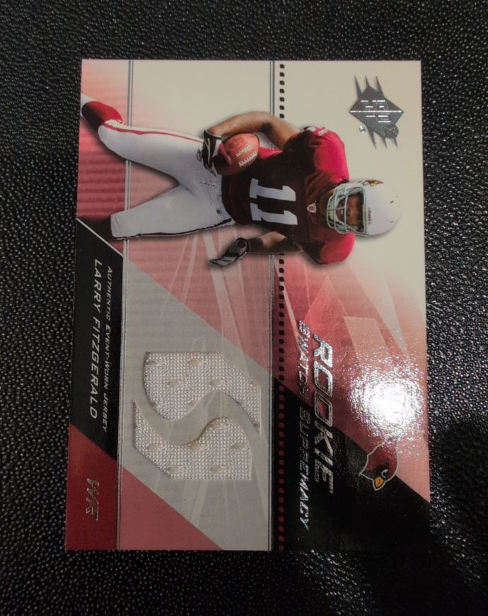 2004 Upper Deck SPx Rookie Swatch Supremacy #SWR-LF Larry Fitzgerald — front