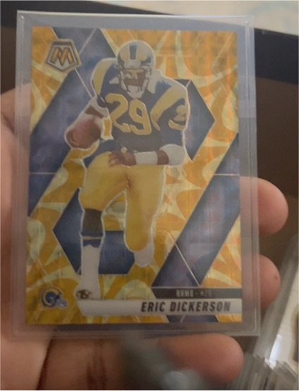 2023 Panini Mosaic #140 Eric Dickerson Reactive Yellow Mosaic Prizm — front
