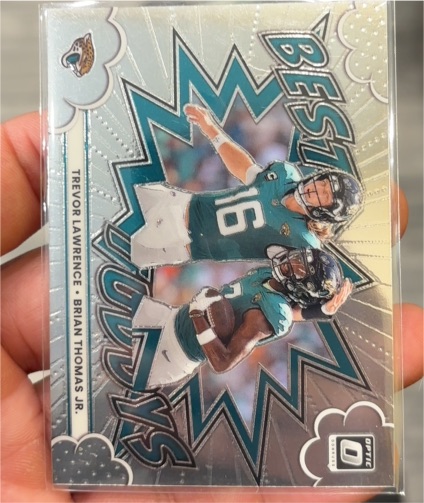 2025 Panini Donruss Optic #10 Best Tuddys Trevor Lawrence Brian Thomas Jr. — front