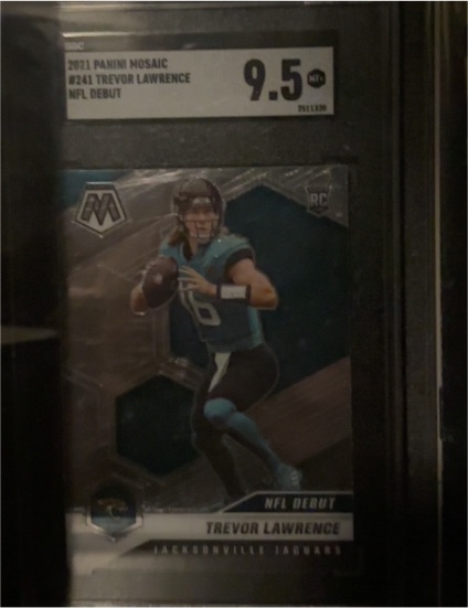 2021 Panini Mosaic #241 Trevor Lawrence NFL Debut — front